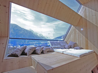 Illustration for article titled This Alpine House Looks Like It Was Beamed Down From Outer Space